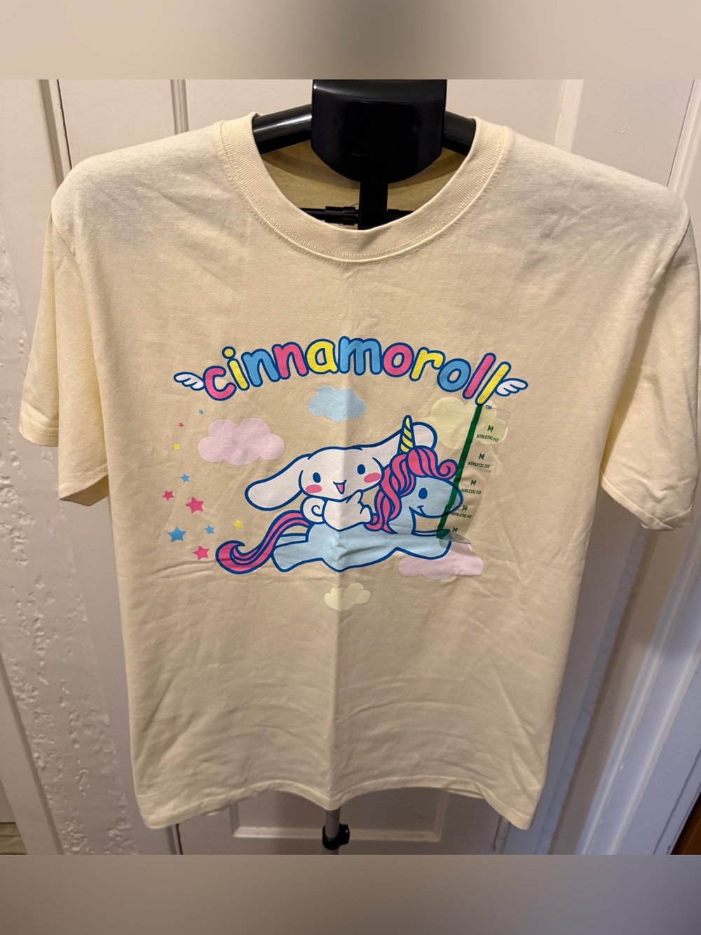 Sanrio Cinnamoroll Cream Tee with Pink & Blue Graphic